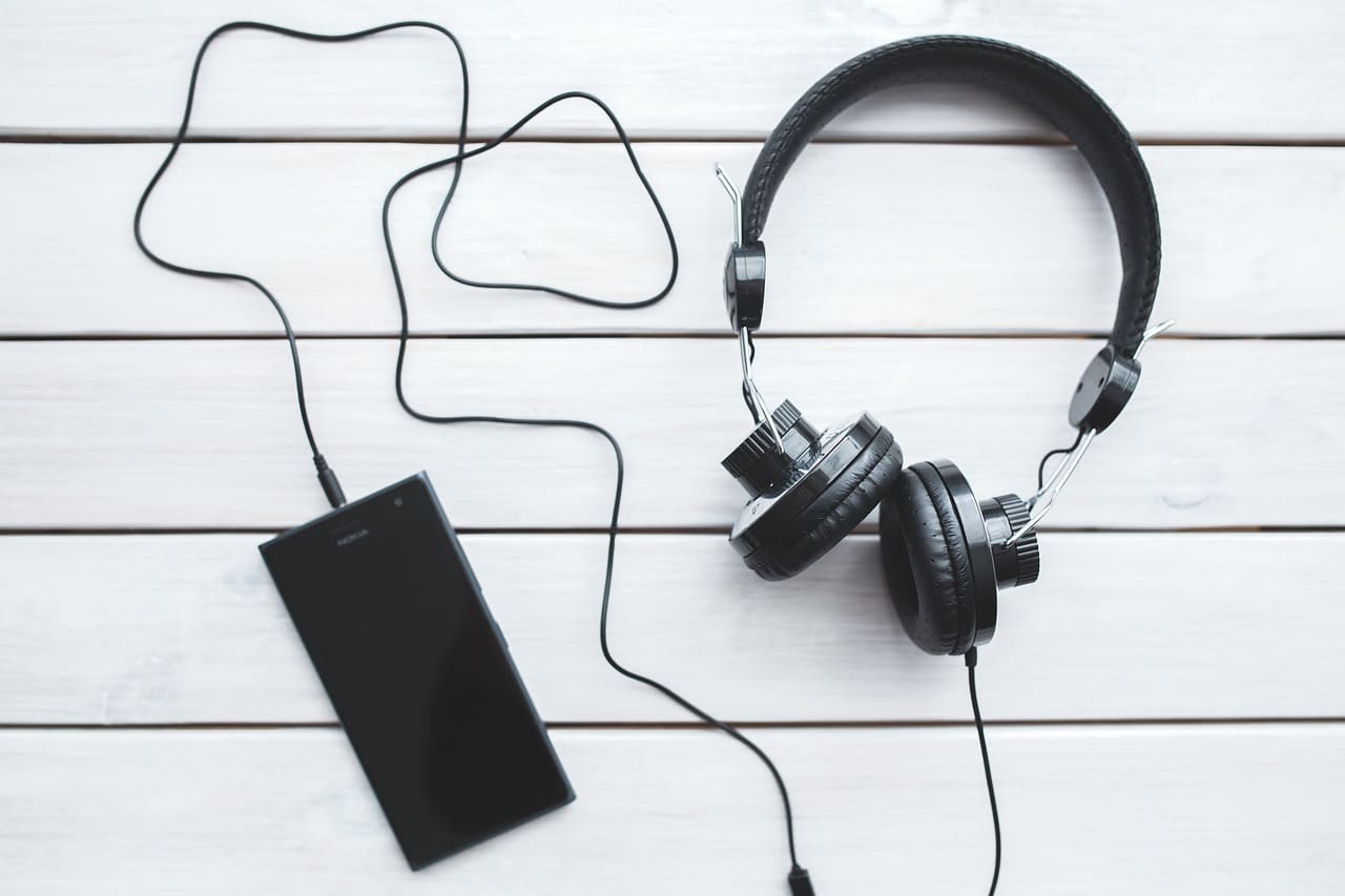 Listening to music and podcasts are effective way to improving a foreign language